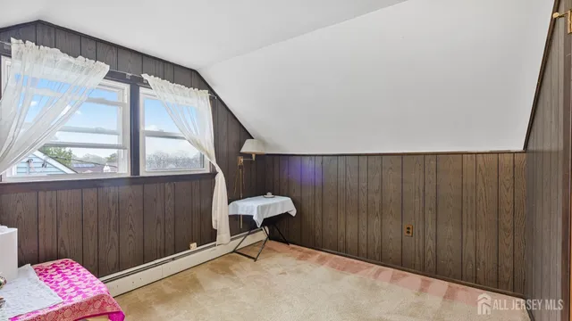 a view of an entryway with a rug