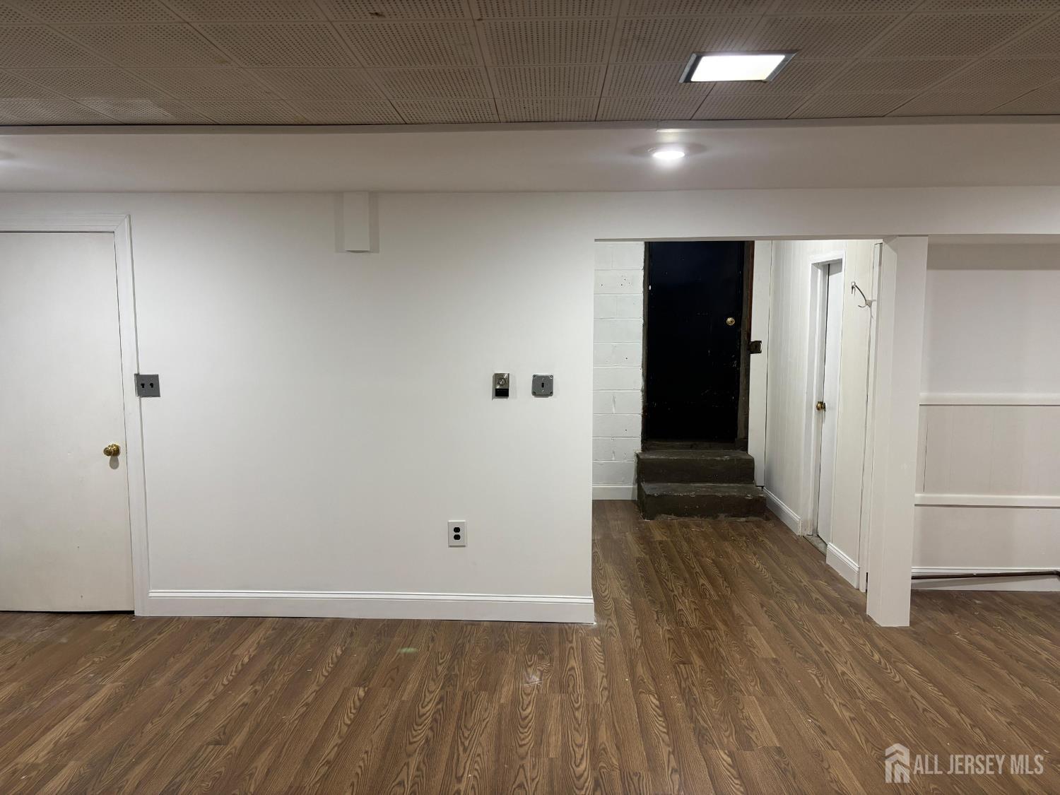 149 Ethel Street Menlo Park Terrace, NJ 08840 - Photo 26 of 26 a view of an empty room with wooden floor