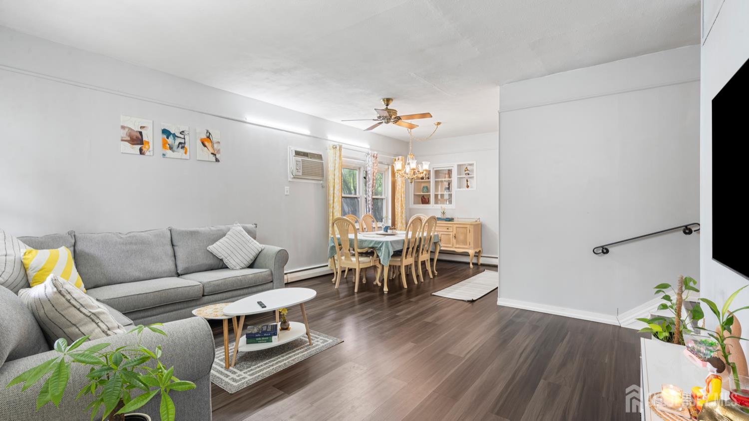 149 Ethel Street Menlo Park Terrace, NJ 08840 - Photo 6 of 26 a living room with furniture and wooden floor
