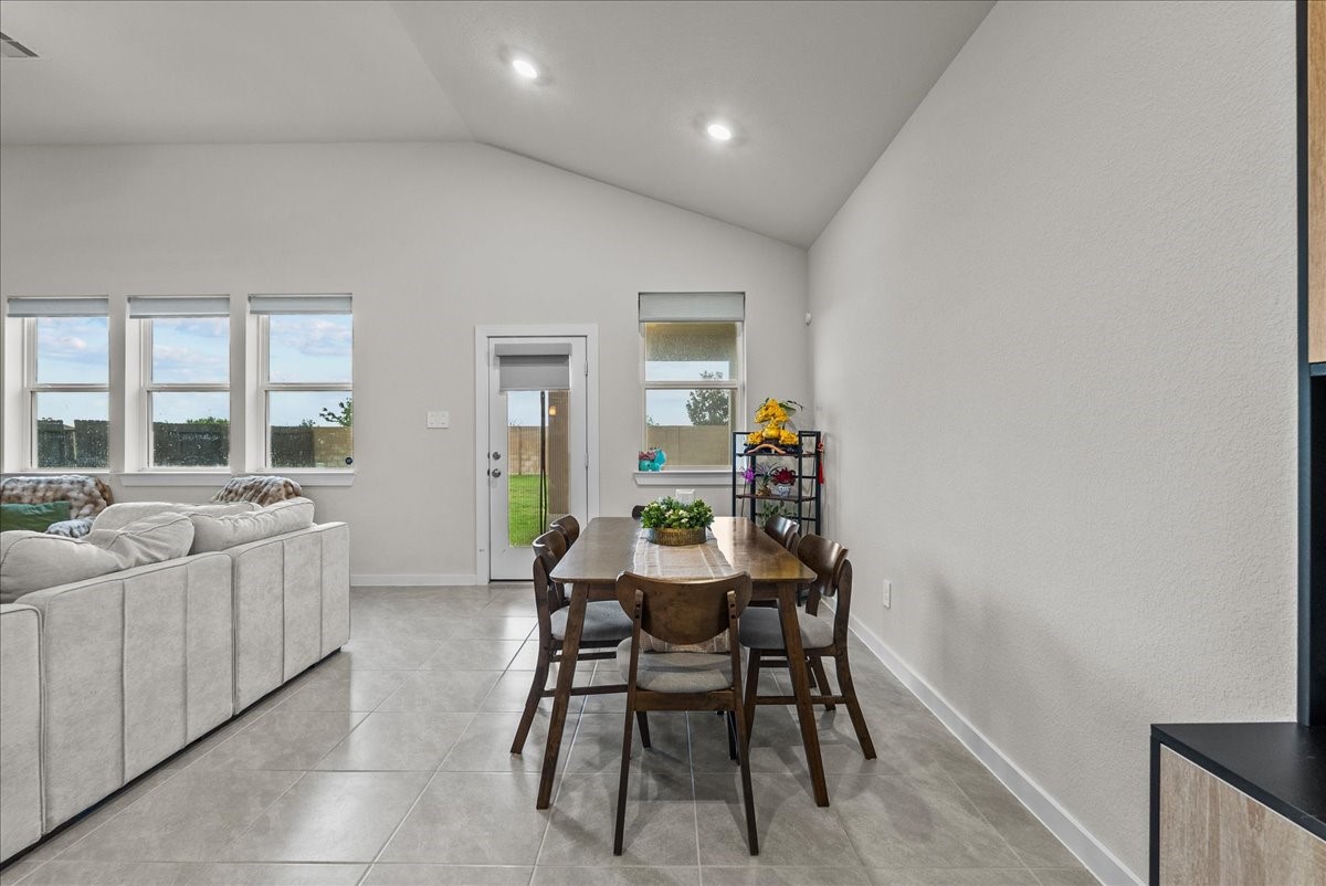 10831 Bodie Hls Drive Rosharon, TX 77583 - Photo 12 of 46 The dining area offers space for a full table and overlooks the backyard.