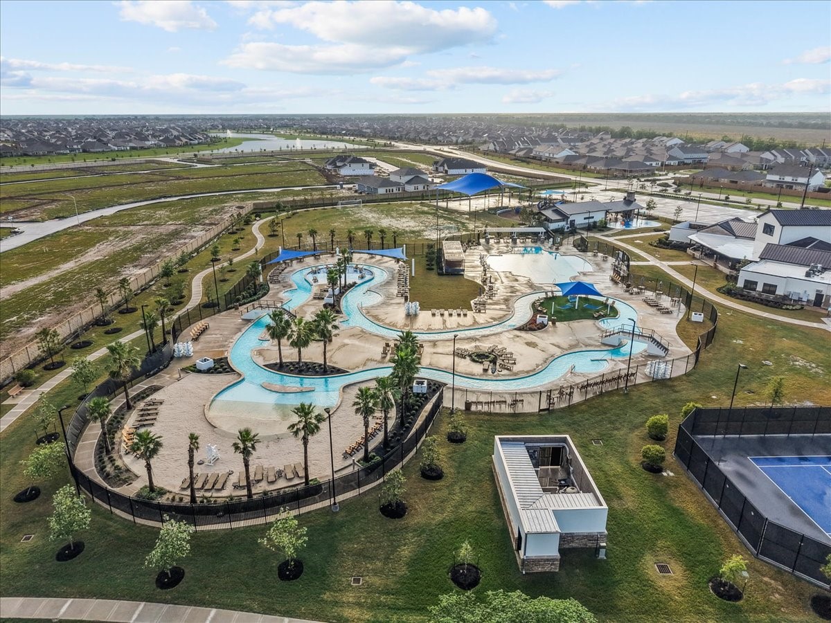 10831 Bodie Hls Drive Rosharon, TX 77583 - Photo 42 of 46 Residents enjoy a resort-style community featuring a fitness center, water play areas, and regular events.