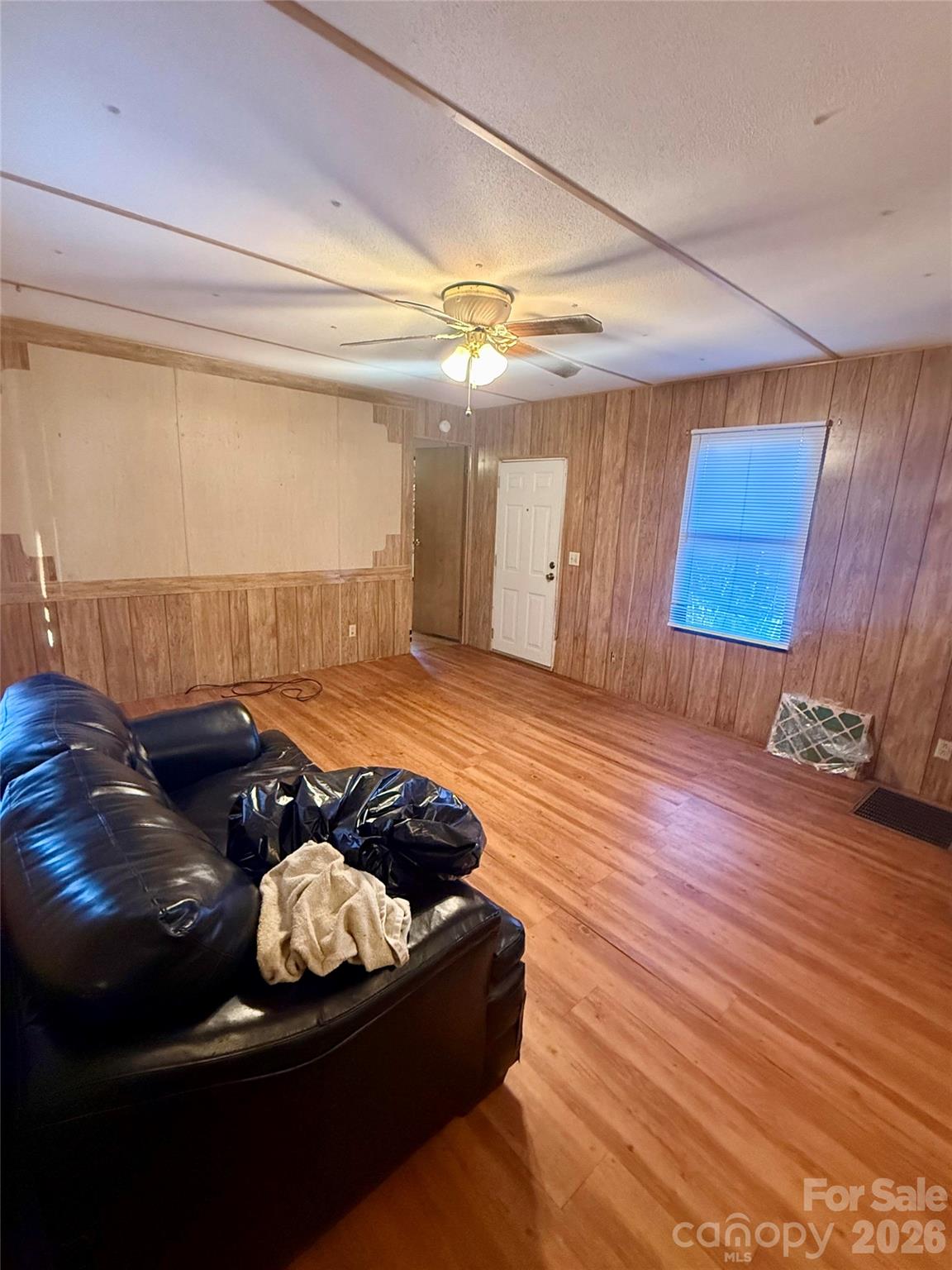 181 Song Sparrow Court Rutherfordton, NC 28139 - Photo 4 of 11 a living room with furniture and a fireplace
