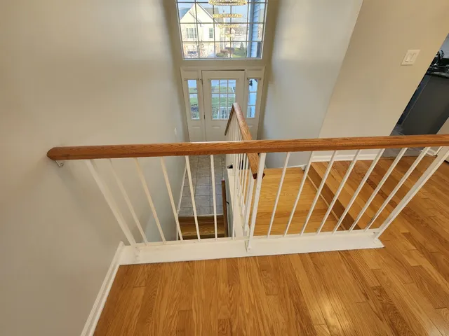 a view of an empty room and a window
