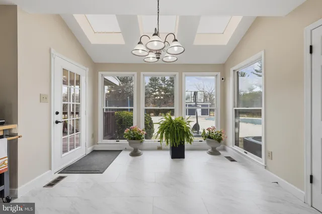 a bathroom with bathtub and shower