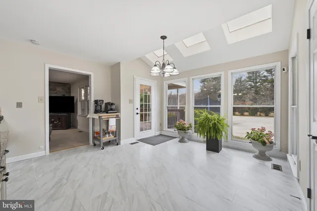 a bathroom with a bathtub and a sink