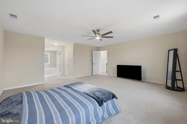 a view of pool and trees in the background