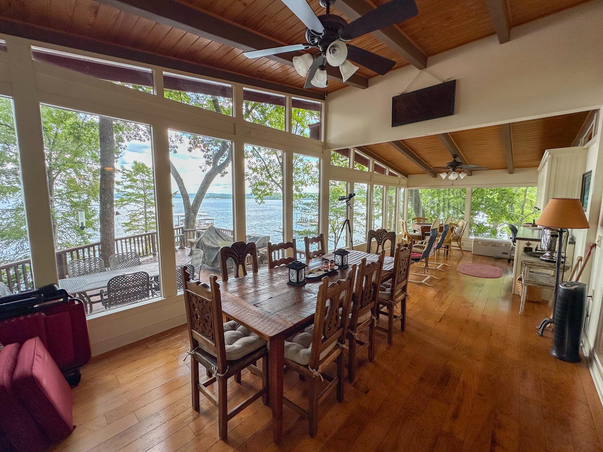 173 Cr 254 Road Iuka, MS 38852 - Photo 14 of 32 a dining room with furniture a chandelier and wooden floor