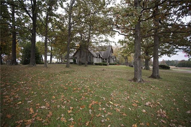 6040 South Mt Juliet Road Hermitage, TN 37076 - Photo 11 of 17 a view of a yard with a tree