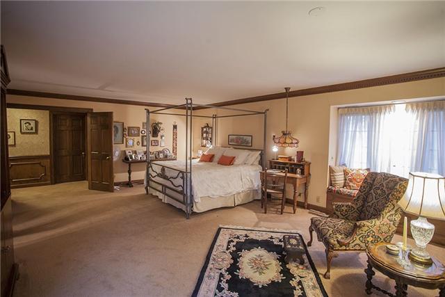6040 South Mt Juliet Road Hermitage, TN 37076 - Photo 12 of 17 a spacious bedroom with a bed and a couch