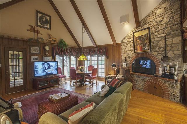 6040 South Mt Juliet Road Hermitage, TN 37076 - Photo 3 of 17 a living room with furniture and a flat screen tv