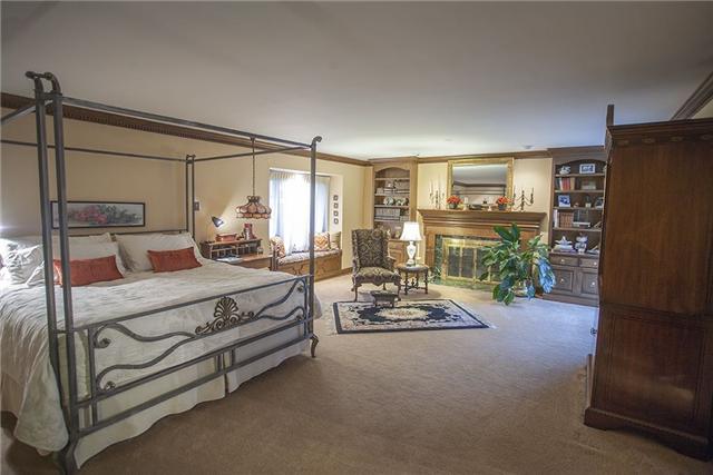 6040 South Mt Juliet Road Hermitage, TN 37076 - Photo 7 of 17 a living room with furniture and a flat screen tv