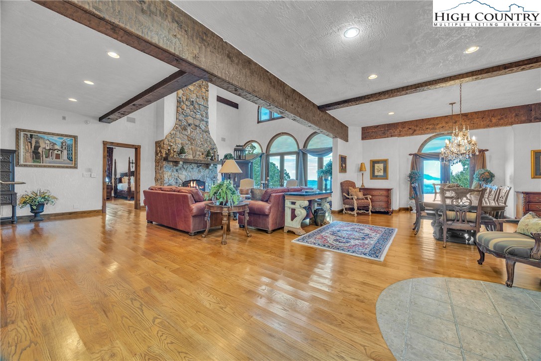 530 Howards Knob Road Boone, NC 28607 - Photo 12 of 49 a living room with furniture and a large window