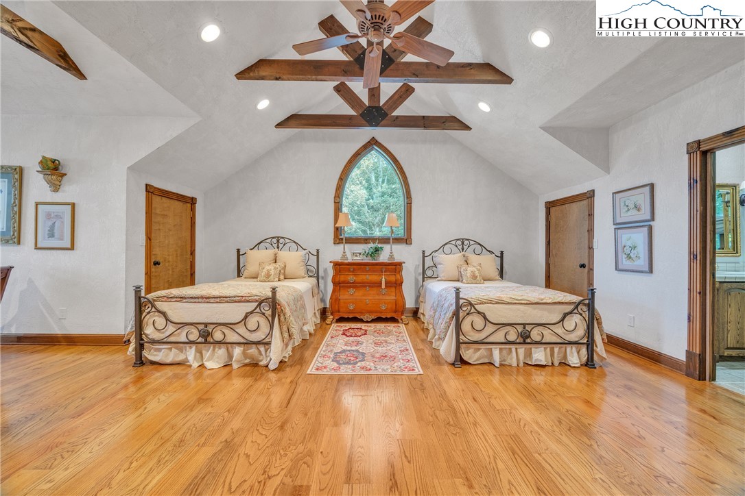 530 Howards Knob Road Boone, NC 28607 - Photo 32 of 49 a living room with furniture and a chandelier