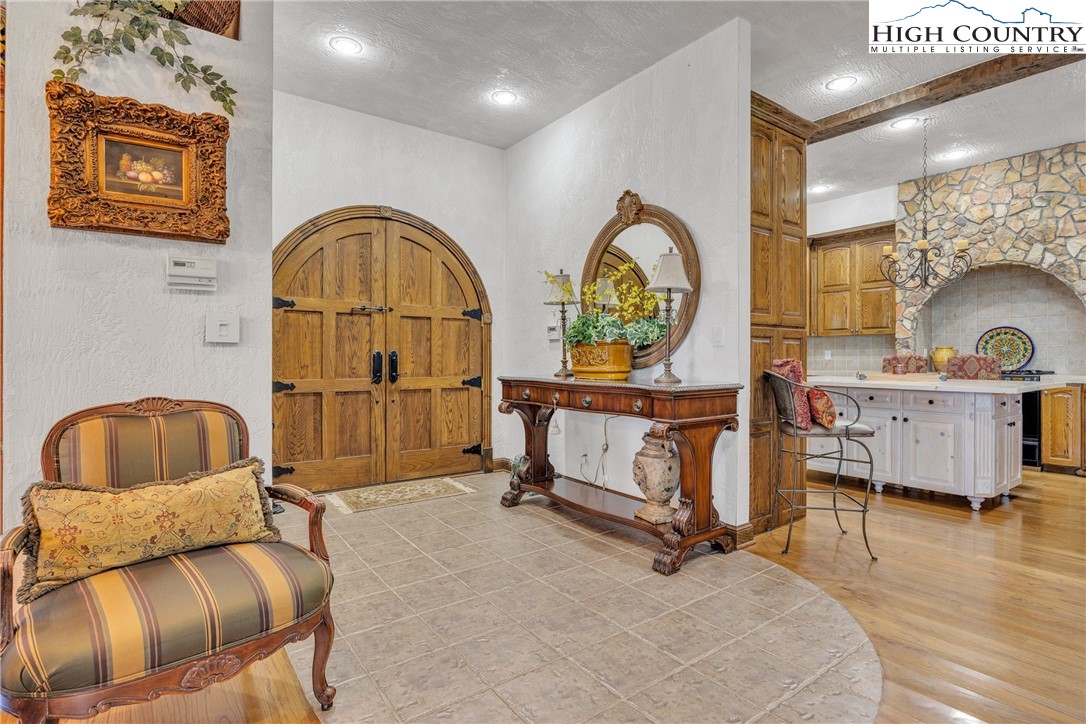 530 Howards Knob Road Boone, NC 28607 - Photo 36 of 49 a living room with furniture and a wooden floor