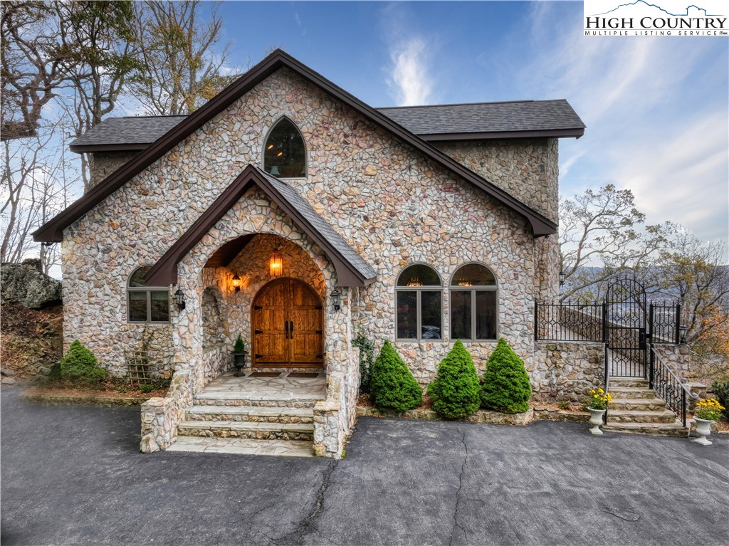 530 Howards Knob Road Boone, NC 28607 - Photo 41 of 49 a front view of a house with a yard
