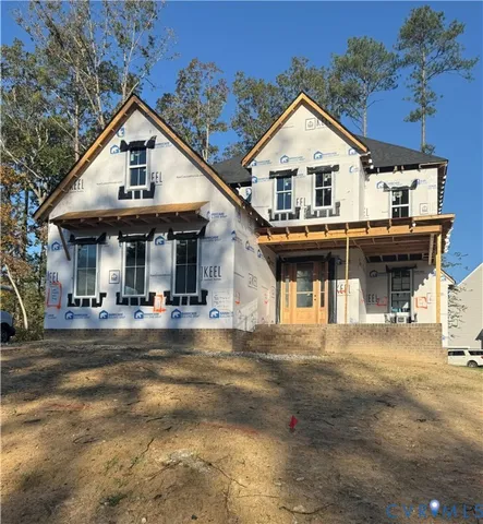 a front view of a house with swimming pool