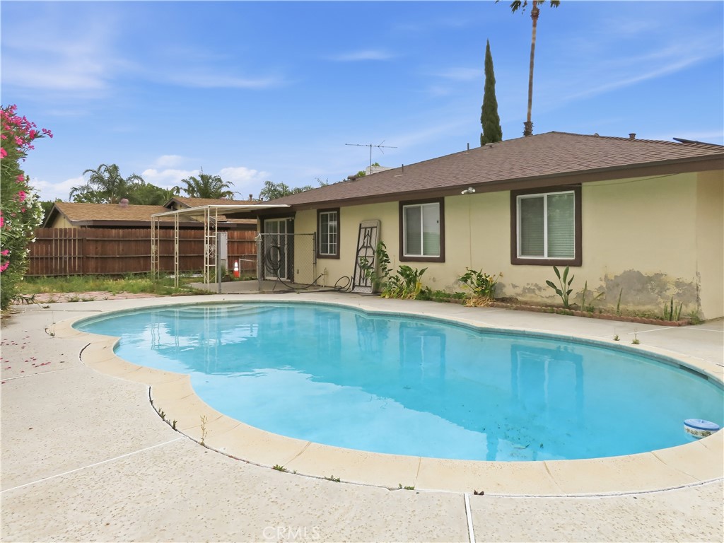 4409 Challen Avenue Riverside, CA 92503 - Photo 26 of 31 a view of a house with swimming pool