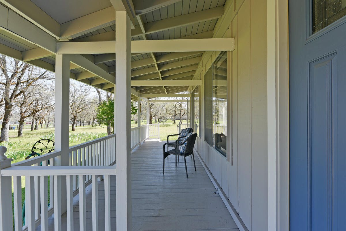 15955 Jones Road White City, OR 97503 - Photo 8 of 36 a view of a porch with furniture and wooden deck