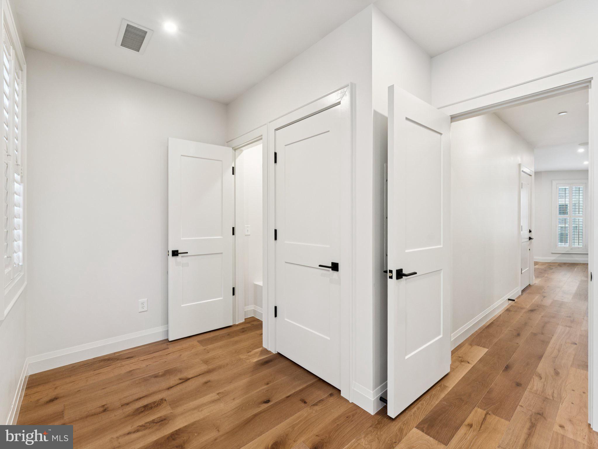 1508 21st Street Northwest, Unit 1 Washington, DC 20036 - Photo 14 of 40 a view of a hallway with wooden floor