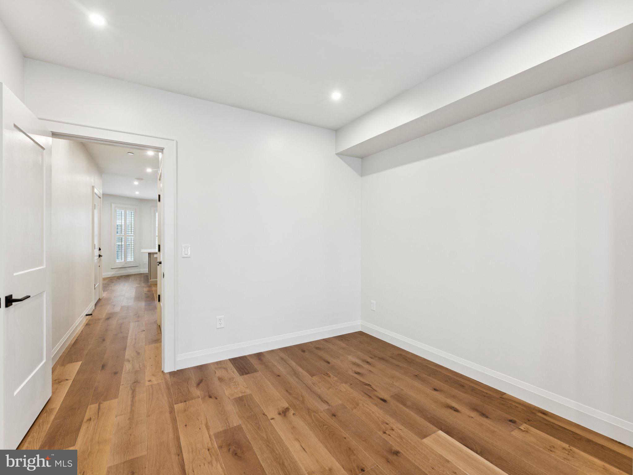 1508 21st Street Northwest, Unit 1 Washington, DC 20036 - Photo 15 of 40 a view of a hallway with wooden floor