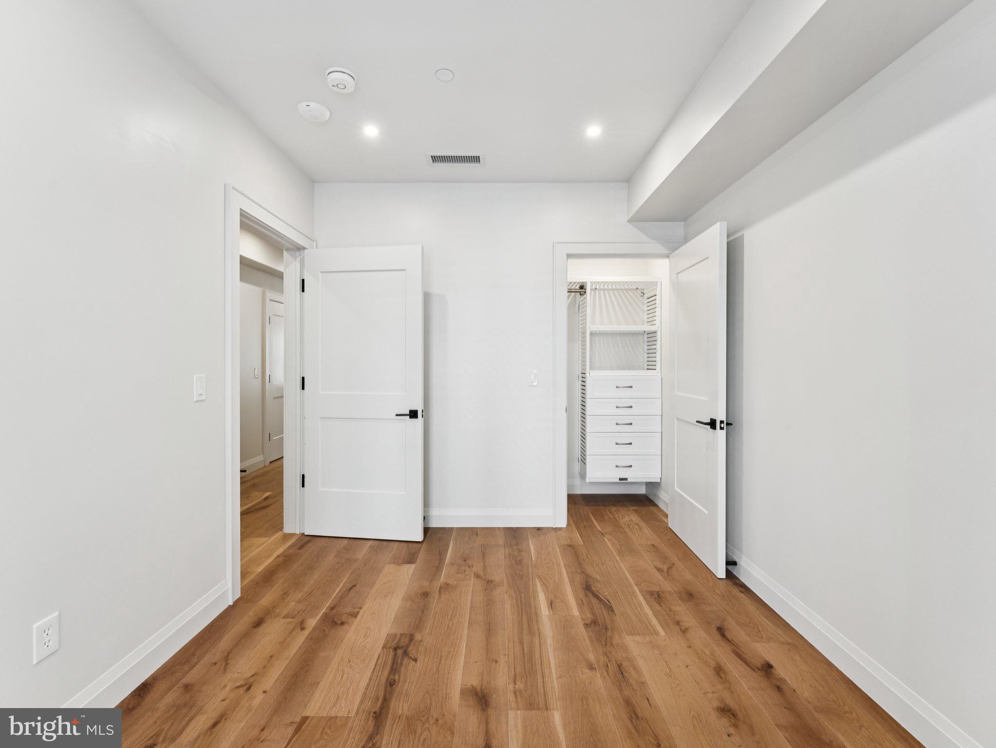 1508 21st Street Northwest, Unit 1 Washington, DC 20036 - Photo 22 of 40 a view of hallway with wooden floor
