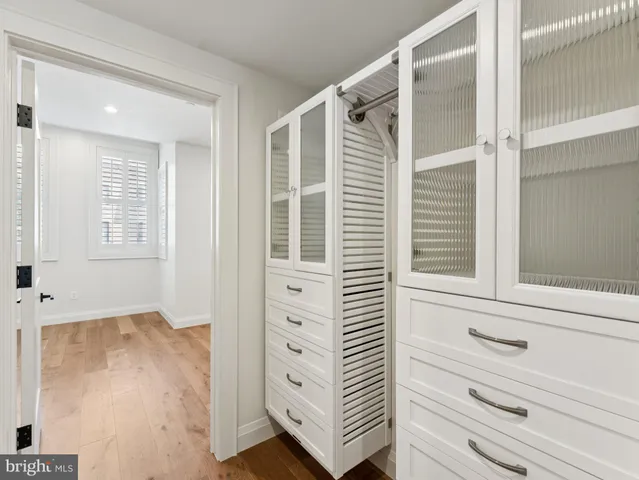 front view of a bedroom with cabinet