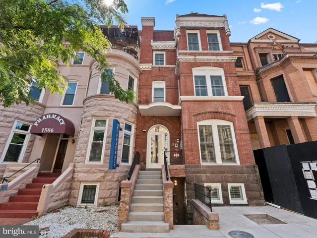 a front view of a multi story residential apartment building