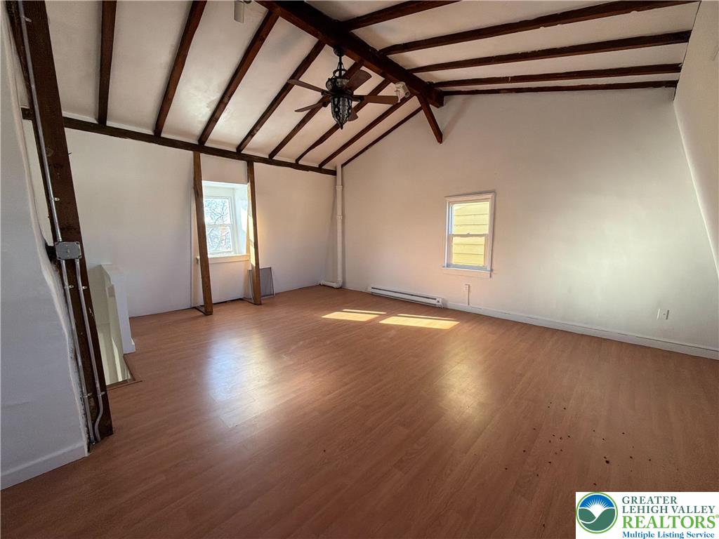 934 Butler Street Easton, PA 18042 - Photo 11 of 14 a view of empty room with wooden floor and fan