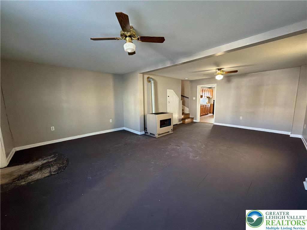 934 Butler Street Easton, PA 18042 - Photo 4 of 14 an empty room with a empty space and windows