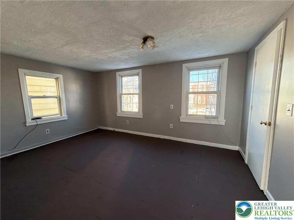 934 Butler Street Easton, PA 18042 - Photo 7 of 14 a view of an empty room with a window