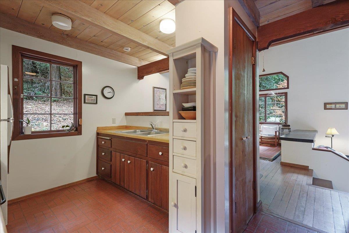 732 Eureka Canyon Road Watsonville, CA 95076 - Photo 14 of 28 a kitchen with a refrigerator and a stove
