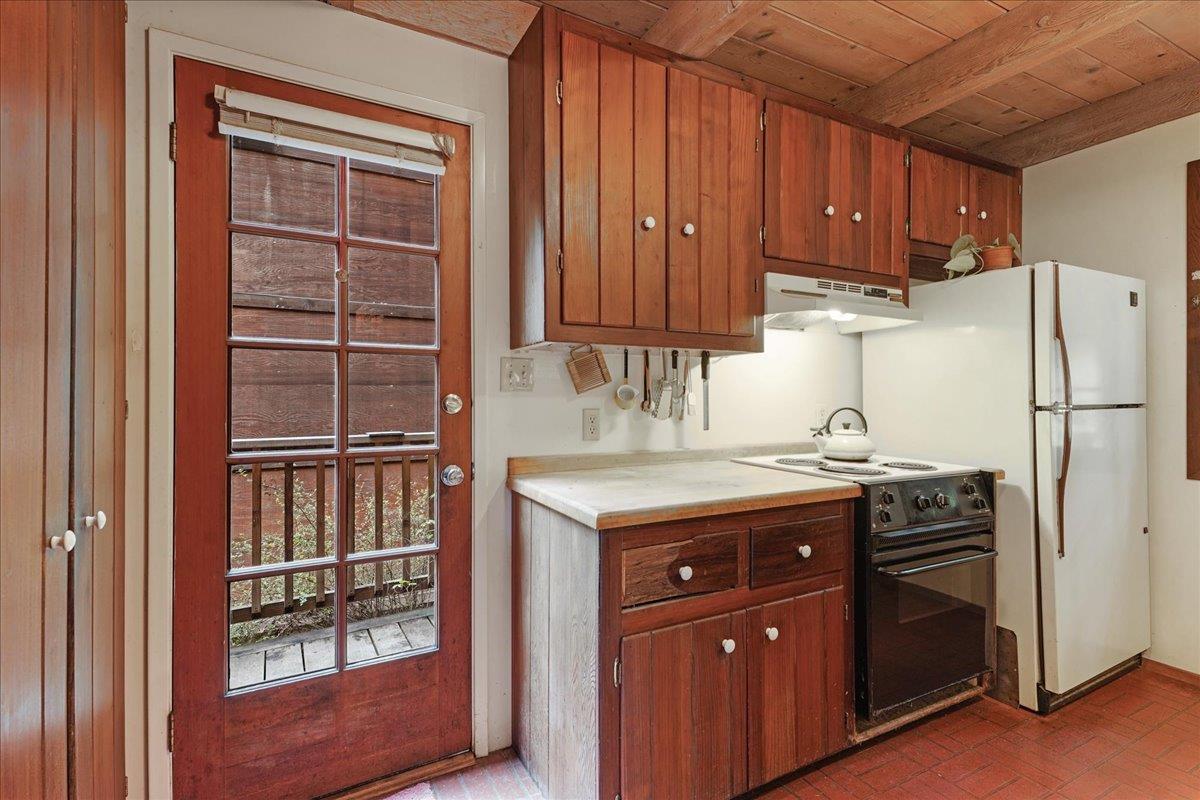 732 Eureka Canyon Road Watsonville, CA 95076 - Photo 15 of 28 a kitchen with stainless steel appliances granite countertop a refrigerator and a sink