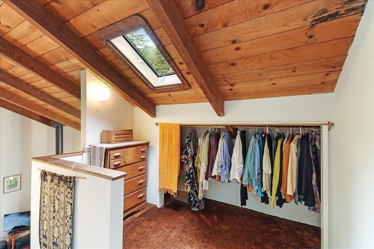 732 Eureka Canyon Road Watsonville, CA 95076 - Photo 18 of 28 a view of walk in closet with clothes and shoes