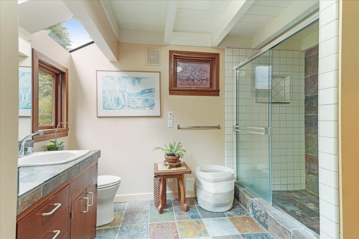 732 Eureka Canyon Road Watsonville, CA 95076 - Photo 19 of 28 a bathroom with a toilet sink and mirror