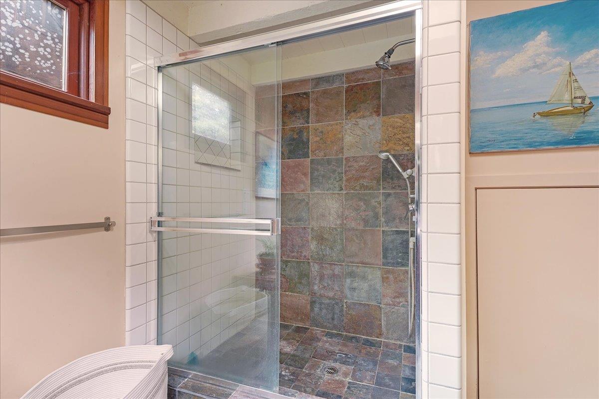 732 Eureka Canyon Road Watsonville, CA 95076 - Photo 21 of 28 a bathroom with a shower and toilet