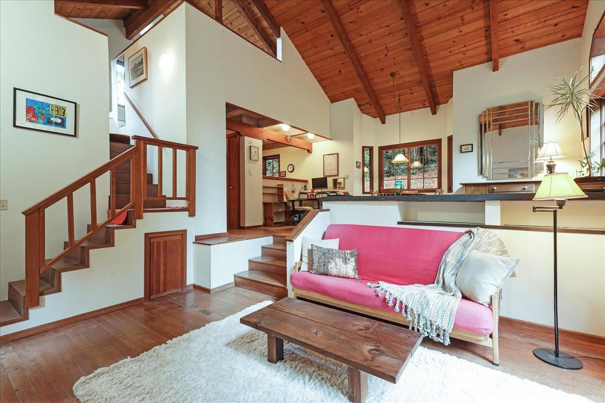 732 Eureka Canyon Road Watsonville, CA 95076 - Photo 5 of 28 a living room with furniture and a wooden floor