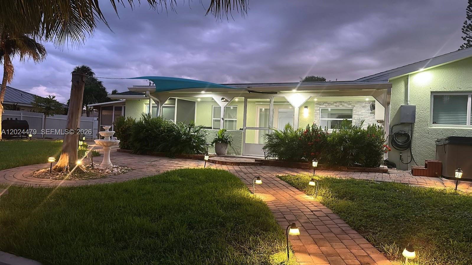 2212 Club House Road North Fort Myers, FL 33917 - Photo 40 of 40 a view of a yard in front of house
