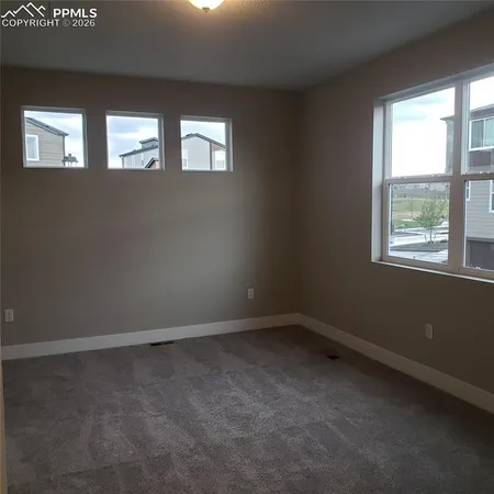 an empty room with a window