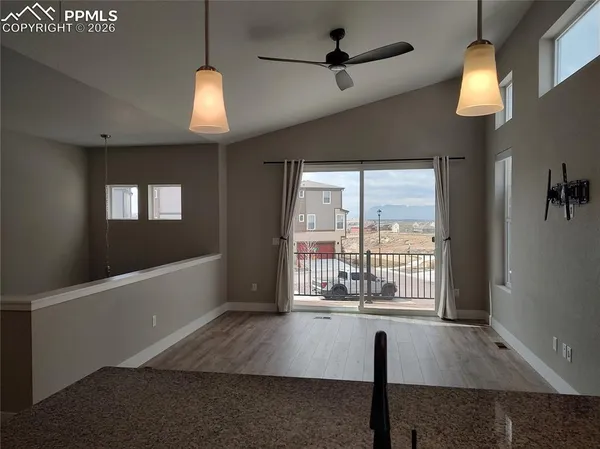 a view of entryway and hall with a window