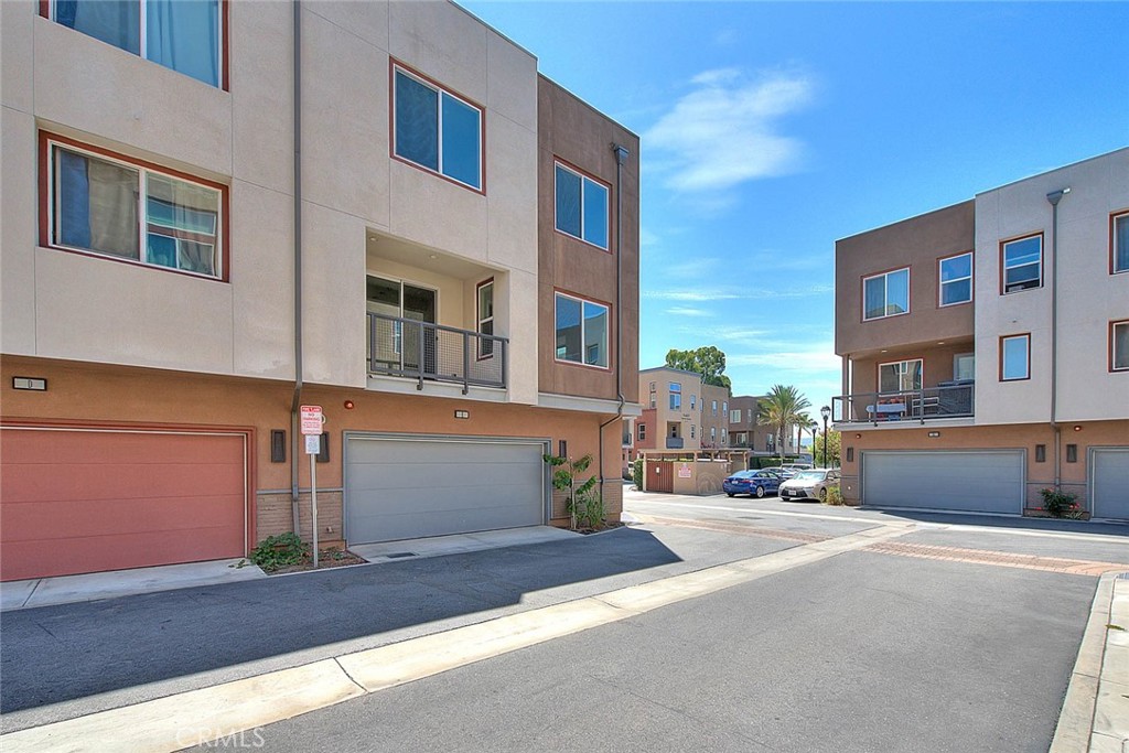 11411 VuePointe Way, Unit E El Monte, CA 91732 - Photo 3 of 38 a view of a building with a street
