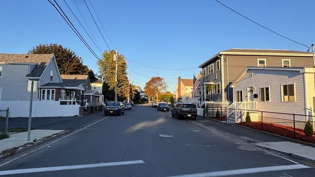 a view of a street with cars