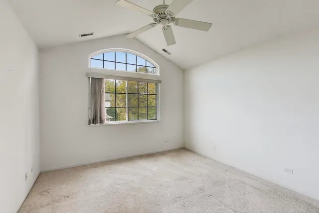 an empty room with a bathroom
