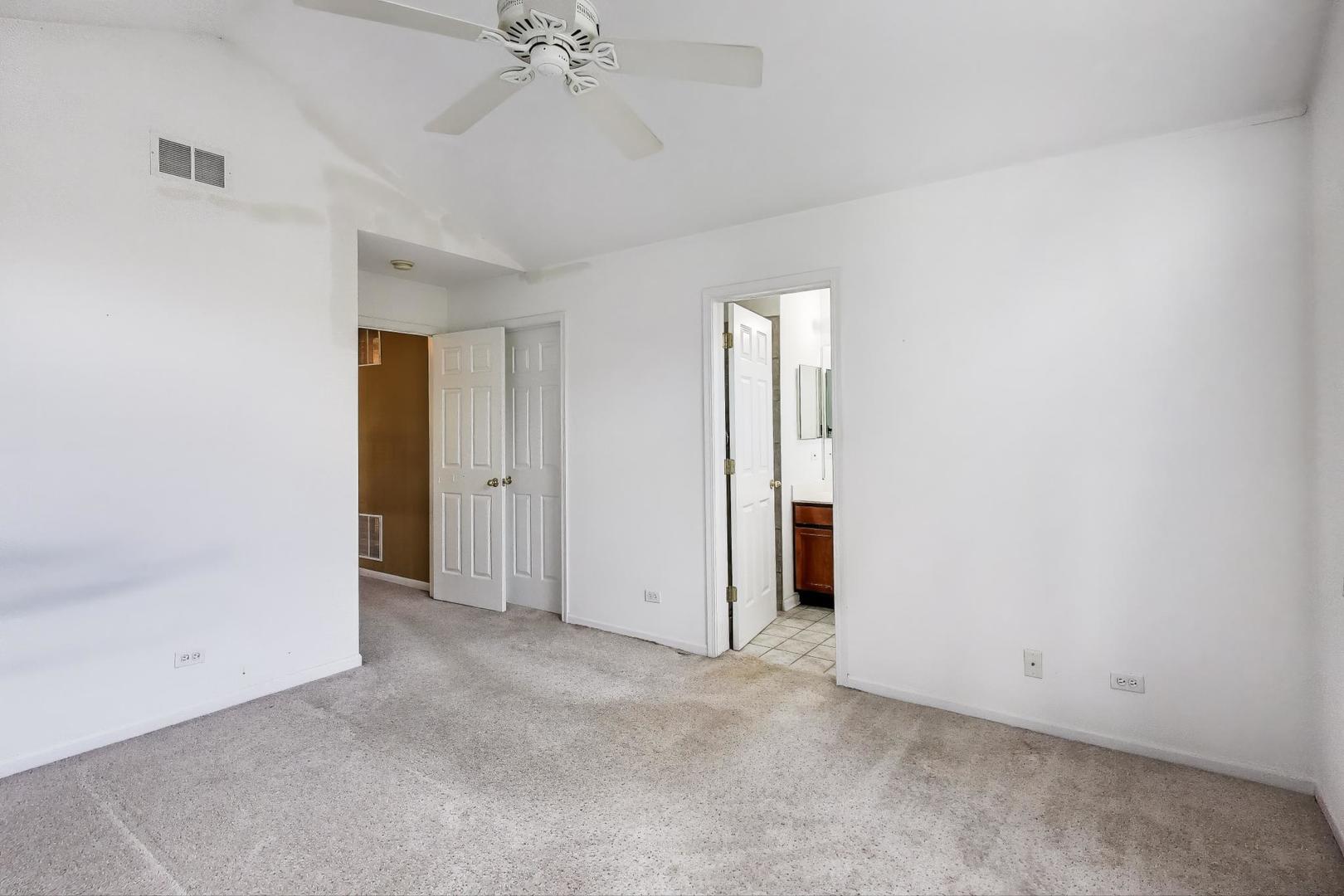 2271 Stoughton Circle Aurora, IL 60502 - Photo 22 of 34 an empty room with a bathroom