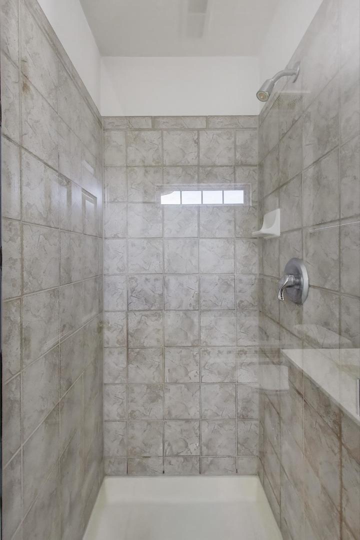 2271 Stoughton Circle Aurora, IL 60502 - Photo 23 of 34 a bathroom with a shower