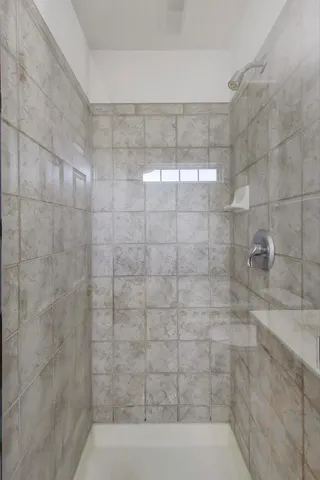 an empty room with a bathroom