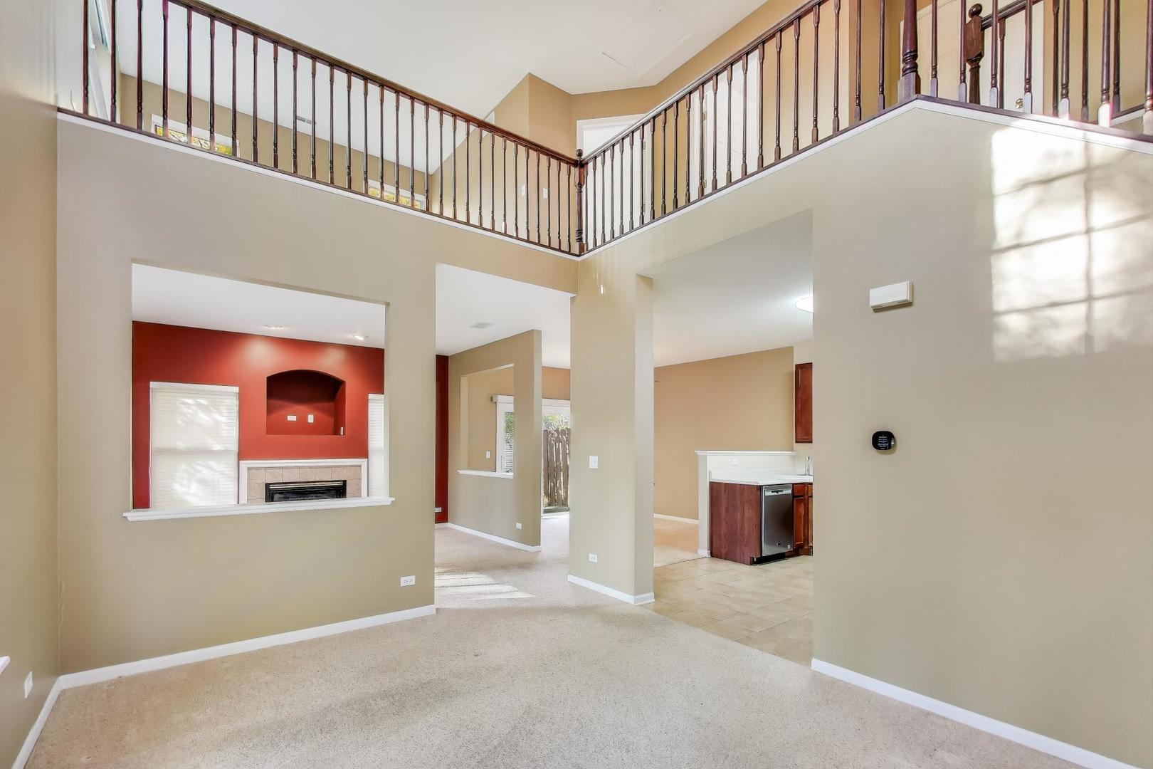 2271 Stoughton Circle Aurora, IL 60502 - Photo 3 of 34 a view interior of a house with entryway and stairs