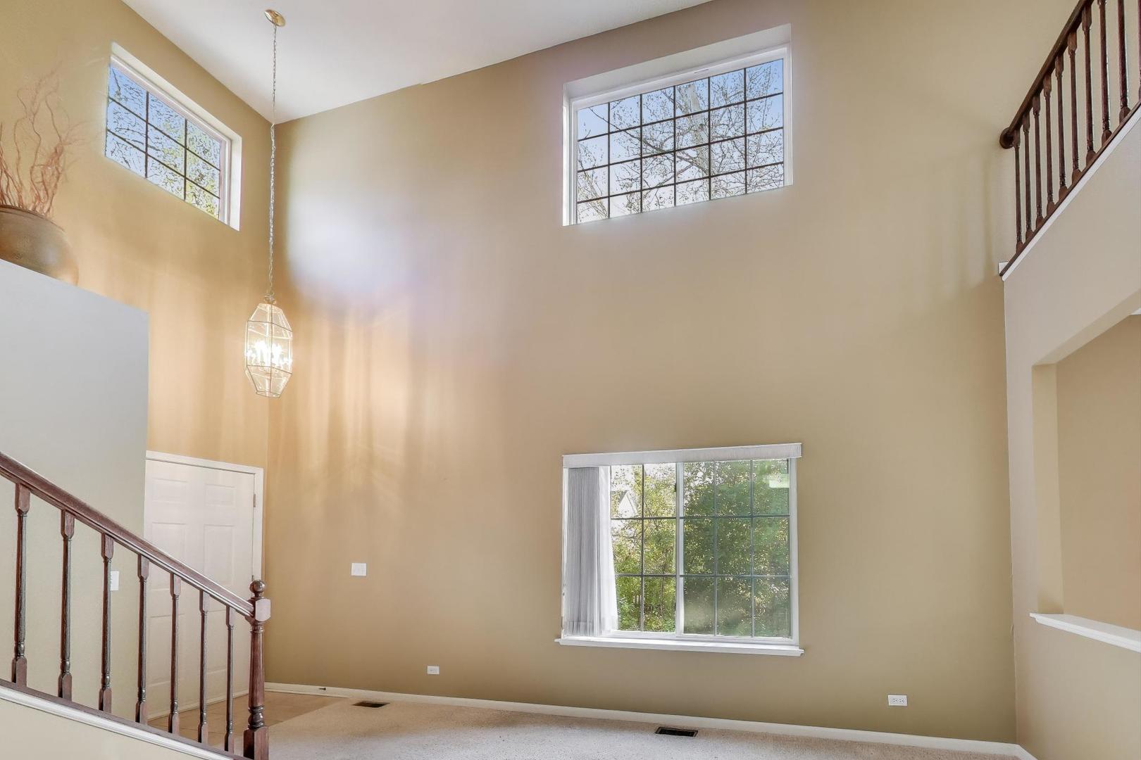 2271 Stoughton Circle Aurora, IL 60502 - Photo 5 of 34 a view of livingroom with windows