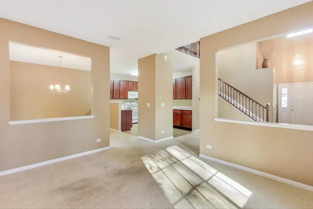a view of livingroom with furniture and stairs