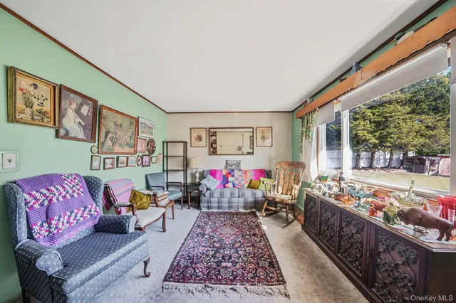 a living room with furniture and a couch