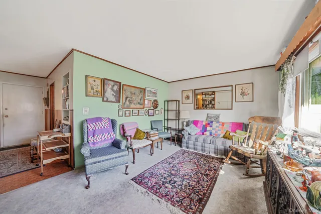 a kitchen with a sink cabinets and a window